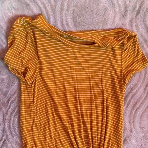 Yellow and white striped t shirt with a knot decor